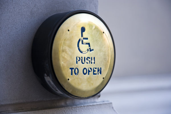 Push to open button for disabled people
