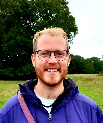 A headshot portrait picture of Rob Milligan, Funding and Partnerships Manager at Tai Pawb