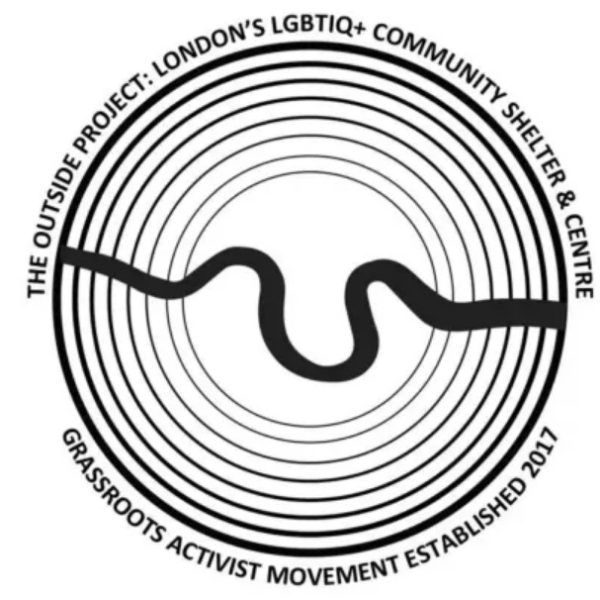 The Outside Project logo, which consists of a black and circle with many layers and a black ribbon running through it, and their name around the outside